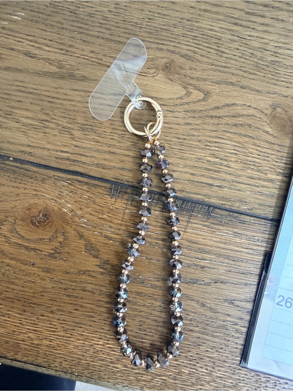 Beaded Phone Strap Wristlet in Metallic Brown